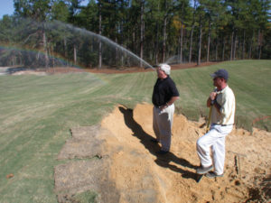 Bill Patton (in black shirt), Director of Golf Course Maintenance, Forest Creek GC