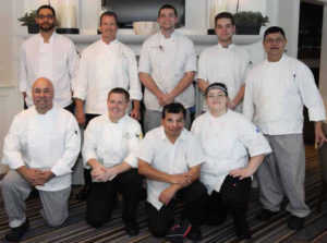 Bottom Row, L to R: Eduardo Agudelo (Line Cook), Joe Dion (Executive Sous Chef), Arturo Velasquez (Line Cook), Amanda Lau (Lead Line Cook). Top Row, L to R : Espedito Cardoso  (Morning Line Cook), Dean Moore (Executive Chef), Zachary Lane (Lead Line Cook), Michele Valeri (Rounds Cook), Mario Ruiz (Prep  Cook)