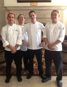 Chef Simon (second from right) gives his sous chefs specific areas of focus that they run as their own “mini-operations.”