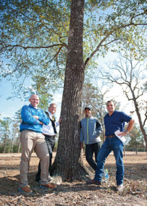 For his first U.S. golf course design project, Tiger Woods has teamed with (from left) Beacon Land Development’s Casey Paulson and Michael Abbott, and Lantern Asset Management’s Andy Mitchell.