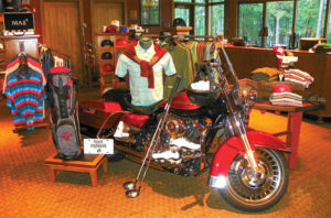 Forest Highlands GC made effective use of a Harley- Davidson motorcycle loaned to it by a member to help create an eye-catching merchandise display. 