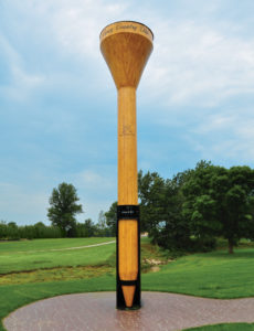 At just over 30 feet tall and 6,659 lbs., the enormous golf tee at Casey Country Club, made of yellow pine, 60 gallons of glue and 120 lbs. of screws, is the world’s largest.