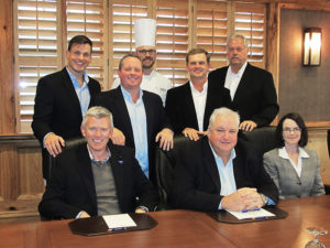 Following a philosophy of getting “the right person on the bus, and then putting them in the right seats,” the staff at Daniel Island Club is hired for personality and then trained for technical skills, says Greg Keating, Vice President of Club Operations. Back row, left to right: Michael Steele, Fitness, Recreation and Aquatics Manager; Matt Smith, Membership Sales Manager; Tyler Dudley, Executive Chef; Ben Cook, Director of Tennis; Rick Marshall, Facilities Manager. Front row, left to right: Chris Edwards, PGA, Director of Golf; Keating; and Terese Dailey, Director of Finance. Missing from photo: Ian Campbell, Director of Clubhouse Operations, and Michael Fabrizio, Director of Grounds and Golf Maintenance.