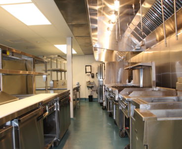 Fiddler's Elbow's banquet kitchen: fryer, stove, and prep area