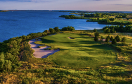 Golf course on a large lake.